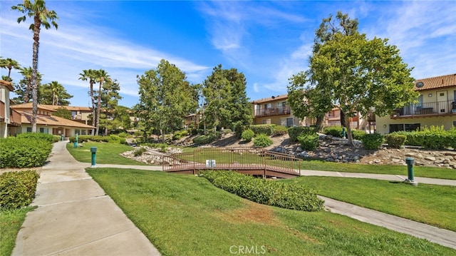 1365 Crafton Ave Unit 1004, Mentone, CA 92359 - view of property's community with a residential view and a lawn