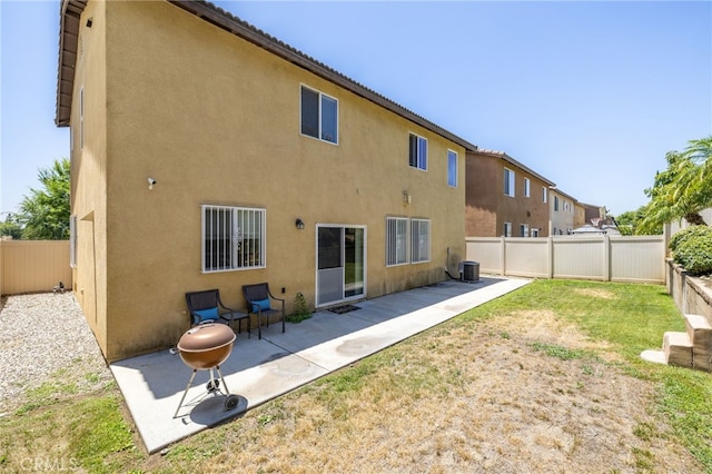 544 W Elm Park Ave, Rialto, CA 92376 - back of house featuring stucco siding, a patio, and a fenced backyard