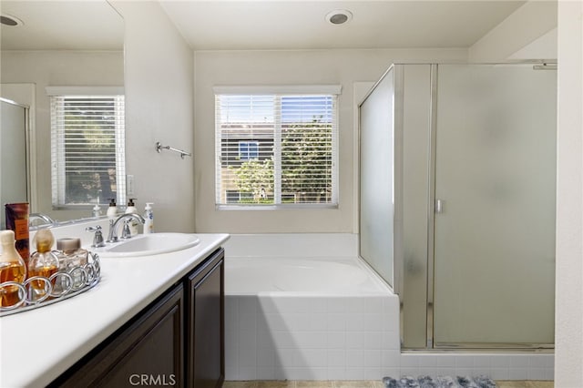 544 W Elm Park Ave, Rialto, CA 92376 - full bath with vanity, a shower stall, and a bath