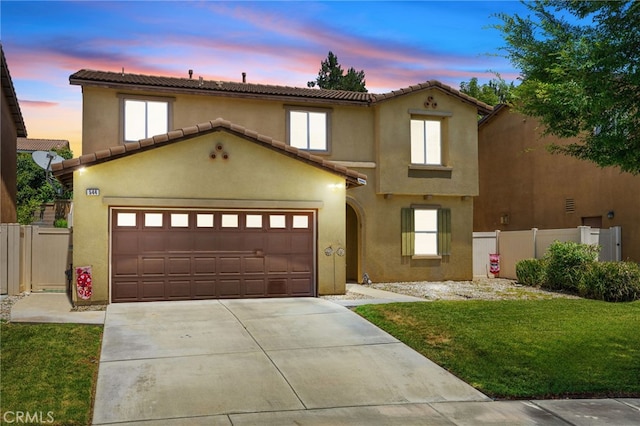 544 W Elm Park Ave, Rialto, CA 92376 - view of front of property featuring driveway, stucco siding, and a tile roof