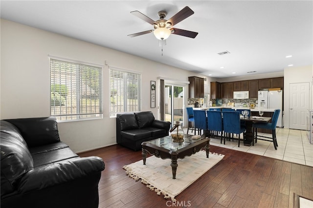 544 W Elm Park Ave, Rialto, CA 92376 - living room featuring a ceiling fan, light wood-type flooring, and recessed lighting