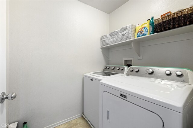 544 W Elm Park Ave, Rialto, CA 92376 - laundry room featuring washer and dryer and baseboards