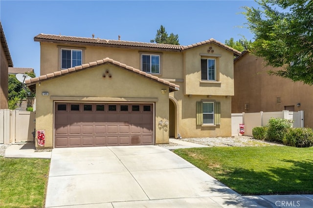 544 W Elm Park Ave, Rialto, CA 92376 - mediterranean / spanish house featuring concrete driveway, stucco siding, a garage, and a tiled roof
