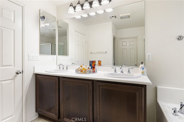 544 W Elm Park Ave, Rialto, CA 92376 - full bath with double vanity and a garden tub