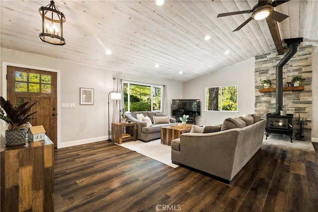 15320 Forest Ranch Way, Forest Ranch, CA 95942 - living room with a wood stove, wood finished floors, healthy amount of natural light, wood ceiling, and a ceiling fan