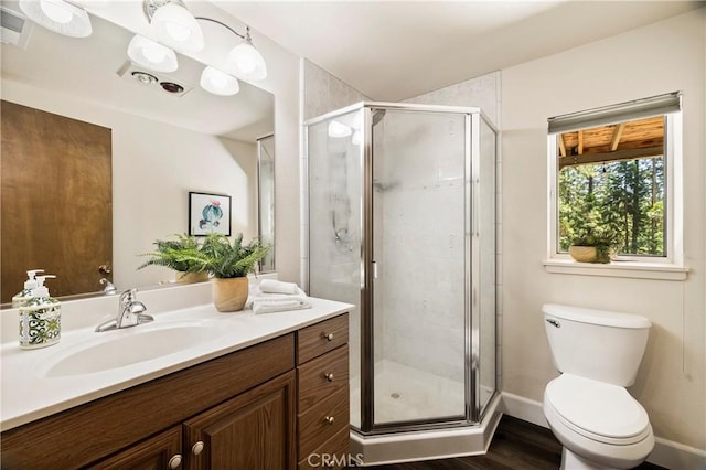 15320 Forest Ranch Way, Forest Ranch, CA 95942 - full bath featuring vanity, a shower stall, and wood finished floors