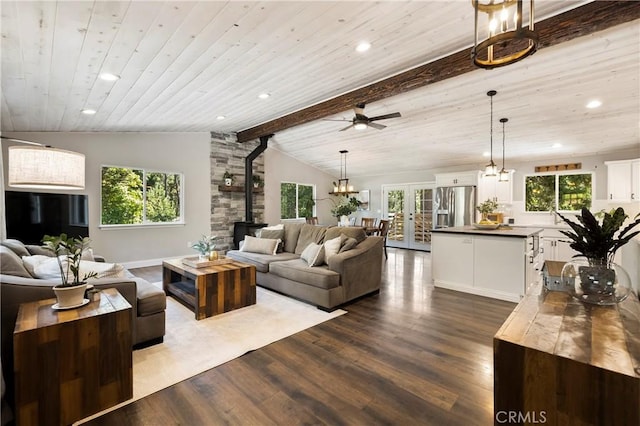 15320 Forest Ranch Way, Forest Ranch, CA 95942 - living room featuring a wood stove, dark wood finished floors, healthy amount of natural light, recessed lighting, and french doors