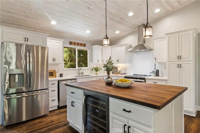 15320 Forest Ranch Way, Forest Ranch, CA 95942 - kitchen with stainless steel appliances, wine cooler, wall chimney exhaust hood, wooden counters, and wood ceiling