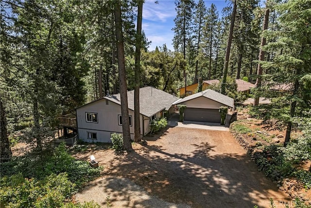 15320 Forest Ranch Way, Forest Ranch, CA 95942 - view of front facade featuring driveway and a forest view