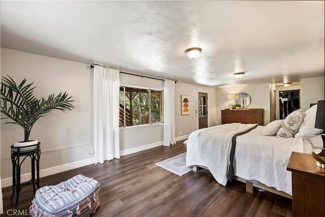 15320 Forest Ranch Way, Forest Ranch, CA 95942 - bedroom with baseboards and dark wood finished floors