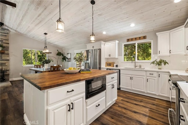 15320 Forest Ranch Way, Forest Ranch, CA 95942 - kitchen featuring appliances with stainless steel finishes, butcher block counters, wooden ceiling, recessed lighting, and backsplash