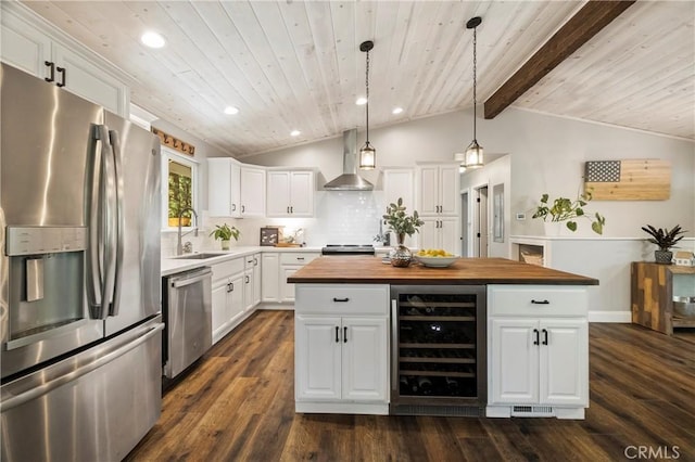 15320 Forest Ranch Way, Forest Ranch, CA 95942 - kitchen with stainless steel appliances, beverage cooler, wall chimney exhaust hood, wooden counters, and a kitchen island