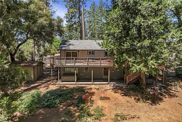 15320 Forest Ranch Way, Forest Ranch, CA 95942 - back of property featuring a storage shed, a wooden deck, roof with shingles, stairway, and a patio