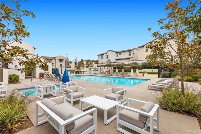 660 Westbrook Loop, San Marcos, CA 92078 - community pool featuring a patio area and a residential view
