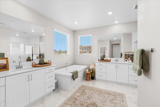 660 Westbrook Loop, San Marcos, CA 92078 - bathroom featuring two vanities, a shower stall, marble finish floors, and recessed lighting