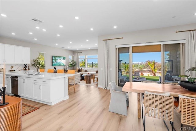 660 Westbrook Loop, San Marcos, CA 92078 - kitchen featuring open floor plan, light wood finished floors, light countertops, and recessed lighting