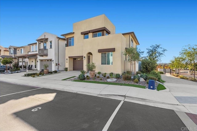 660 Westbrook Loop, San Marcos, CA 92078 - view of front facade featuring stucco siding, an attached garage, a residential view, and a balcony