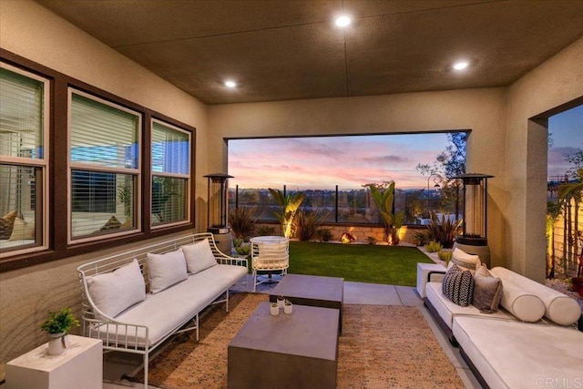 660 Westbrook Loop, San Marcos, CA 92078 - patio terrace at dusk featuring outdoor lounge area, a fenced backyard, and a patio area