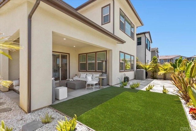 660 Westbrook Loop, San Marcos, CA 92078 - rear view of house featuring an outdoor hangout area, a patio, stucco siding, and a fenced backyard