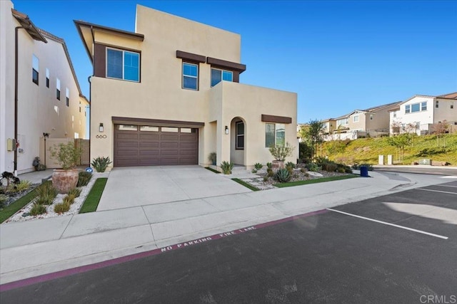 660 Westbrook Loop, San Marcos, CA 92078 - view of front of home with stucco siding, a residential view, an attached garage, and concrete driveway
