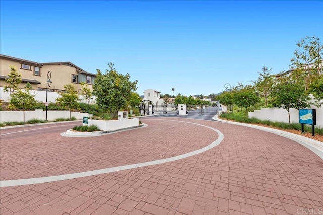 660 Westbrook Loop, San Marcos, CA 92078 - view of community featuring a gate and a residential view