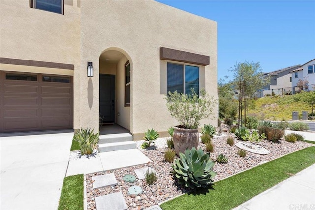 660 Westbrook Loop, San Marcos, CA 92078 - view of front of property featuring stucco siding and driveway