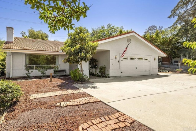2239 Sunset Dr, Escondido, CA 92025 - ranch-style house featuring a garage, a tile roof, a chimney, driveway, and stucco siding
