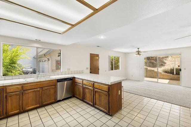 2239 Sunset Dr, Escondido, CA 92025 - kitchen featuring stainless steel dishwasher, plenty of natural light, light tile patterned floors, and recessed lighting