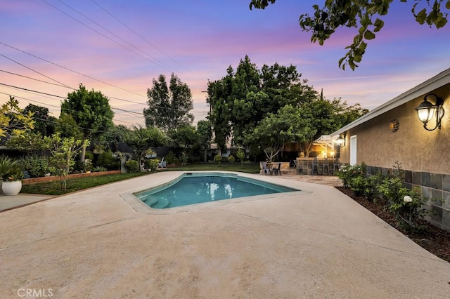 7951 Woodlake Ave, West Hills, CA 91304 - view of swimming pool featuring a patio area
