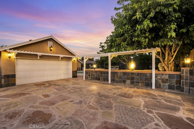 7951 Woodlake Ave, West Hills, CA 91304 - view of front of home featuring stucco siding and a garage