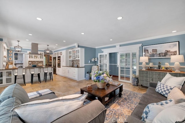 7951 Woodlake Ave, West Hills, CA 91304 - living area featuring crown molding and recessed lighting