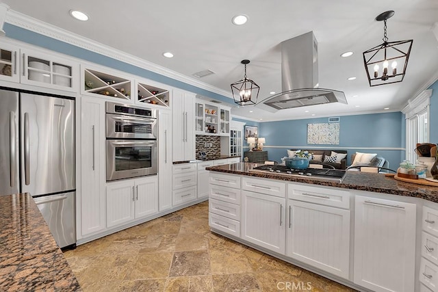 7951 Woodlake Ave, West Hills, CA 91304 - kitchen featuring appliances with stainless steel finishes, island exhaust hood, a chandelier, recessed lighting, and white cabinets