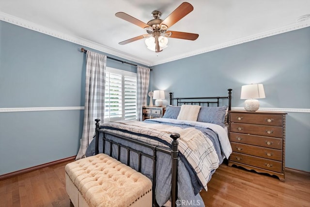 7951 Woodlake Ave, West Hills, CA 91304 - bedroom featuring wood finished floors, ornamental molding, and ceiling fan