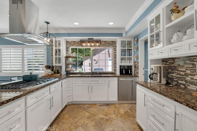 7951 Woodlake Ave, West Hills, CA 91304 - kitchen with island range hood, appliances with stainless steel finishes, decorative backsplash, ornamental molding, and white cabinets