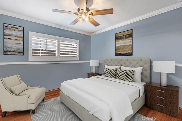 7951 Woodlake Ave, West Hills, CA 91304 - bedroom with wood finished floors, a ceiling fan, and ornamental molding