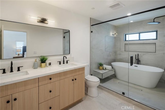 20109 Archwood St, Winnetka, CA 91306 - full bathroom with double vanity, a freestanding bath, and a stall shower