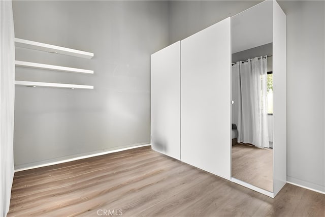 21730 Marylee St Unit 29, Woodland Hills, CA 91367 - empty room with wood finished floors