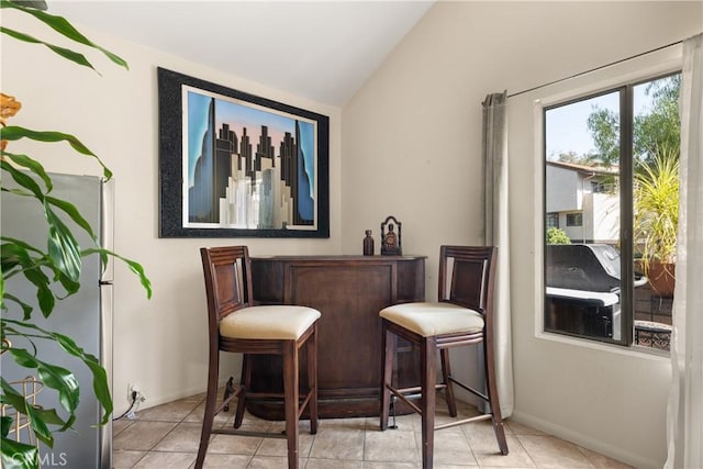 21730 Marylee St Unit 29, Woodland Hills, CA 91367 - bar featuring lofted ceiling and light tile patterned floors