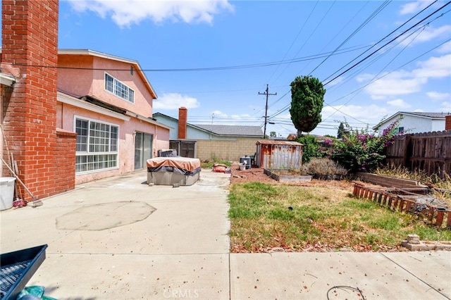 19722 Tajauta Ave, Carson, CA 90746 - fenced backyard with a shed and a patio