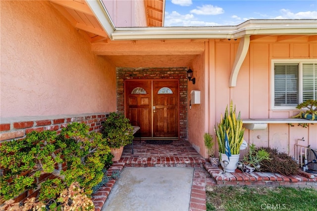 19722 Tajauta Ave, Carson, CA 90746 - doorway to property featuring board and batten siding