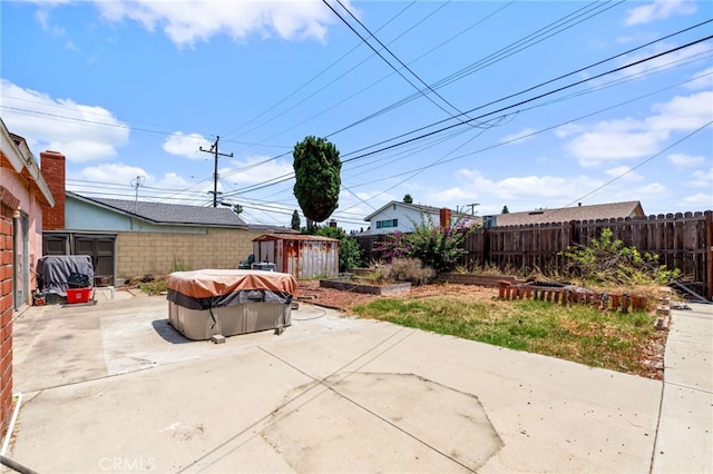 19722 Tajauta Ave, Carson, CA 90746 - fenced backyard featuring a patio area and a shed