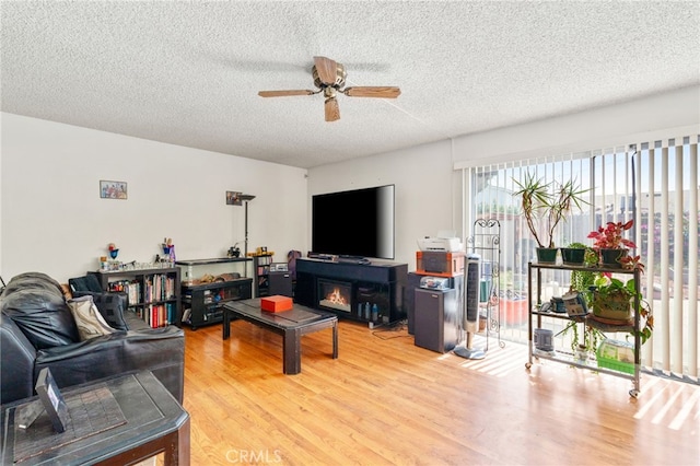 19722 Tajauta Ave, Carson, CA 90746 - living room with a ceiling fan, wood finished floors, and a textured ceiling