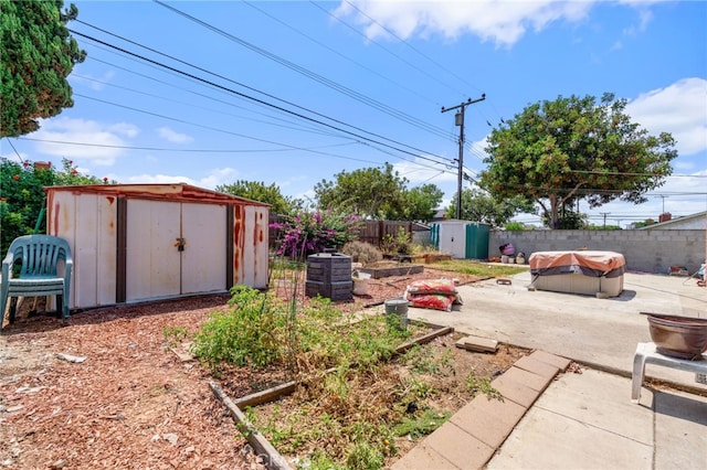 19722 Tajauta Ave, Carson, CA 90746 - fenced backyard with a storage shed and a patio area