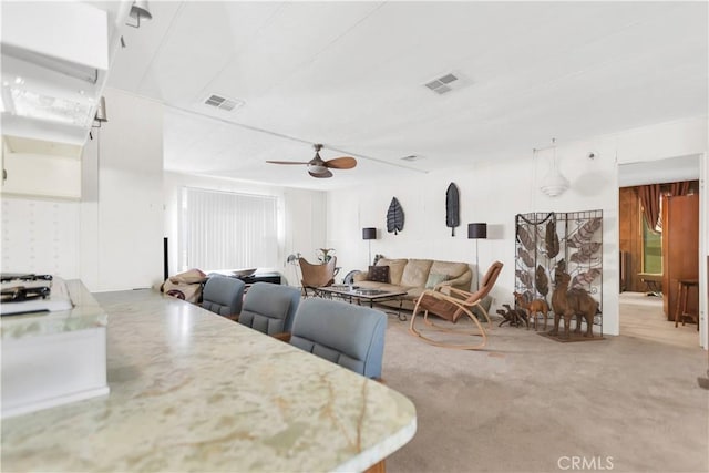 74084 Mercury Cir W, Palm Desert, CA 92260 - carpeted dining room featuring ceiling fan