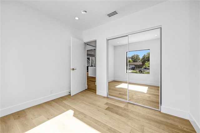 1027 N Lamer St, Burbank, CA 91506 - unfurnished bedroom with wood finished floors, a closet, and recessed lighting