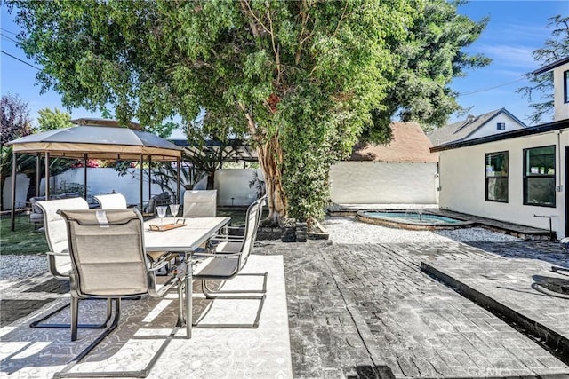 1027 N Lamer St, Burbank, CA 91506 - fenced backyard featuring an in-ground hot tub, a gazebo, a patio, and outdoor dining space