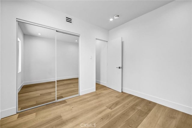 1027 N Lamer St, Burbank, CA 91506 - unfurnished bedroom with wood finished floors, a closet, and recessed lighting