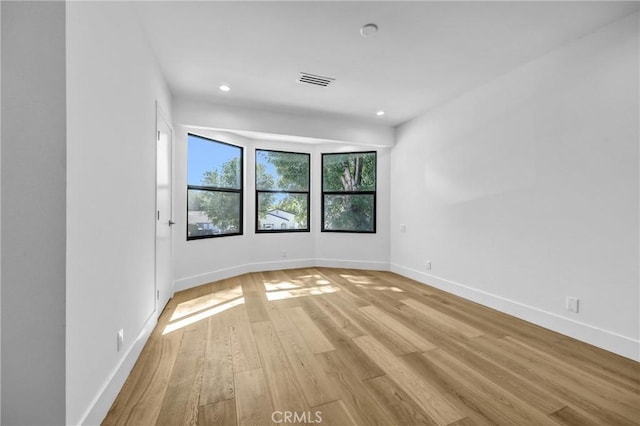 1027 N Lamer St, Burbank, CA 91506 - empty room featuring light wood-style floors and recessed lighting