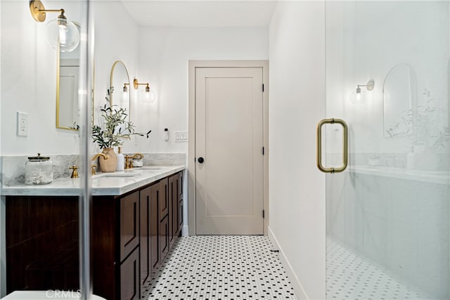 229 S Kingsley Dr, Los Angeles, CA 90004 - full bath featuring double vanity, a shower stall, and tile patterned floors