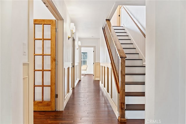 229 S Kingsley Dr, Los Angeles, CA 90004 - hall with dark wood-type flooring and stairway